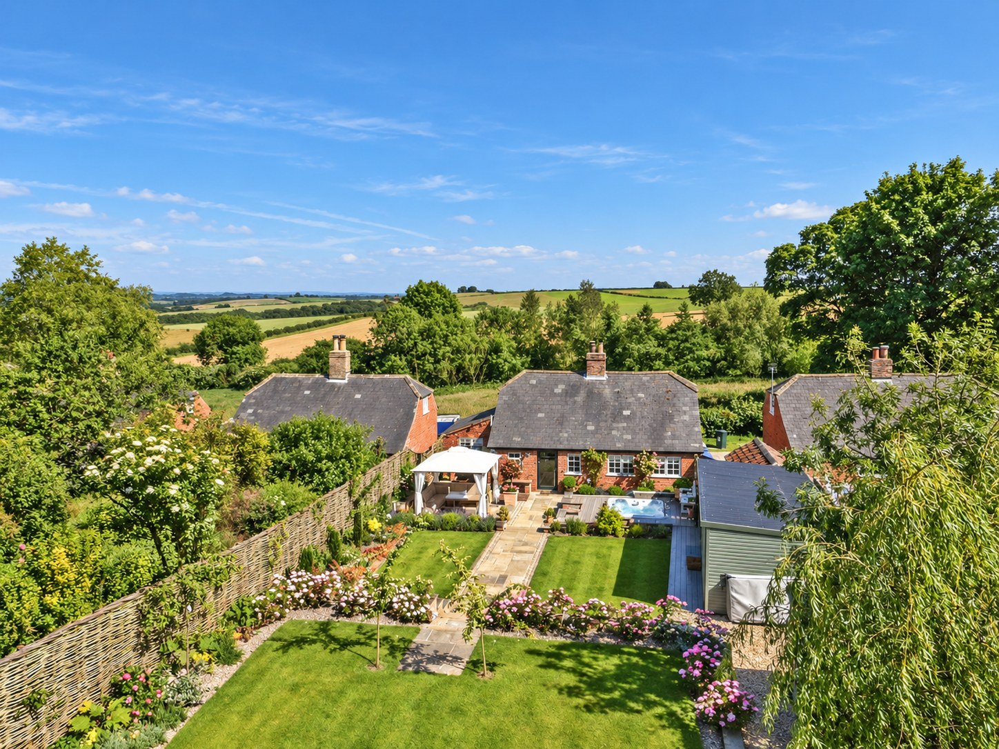 Aerial view of Jolls Cottage, its garden and the Wolds landscape